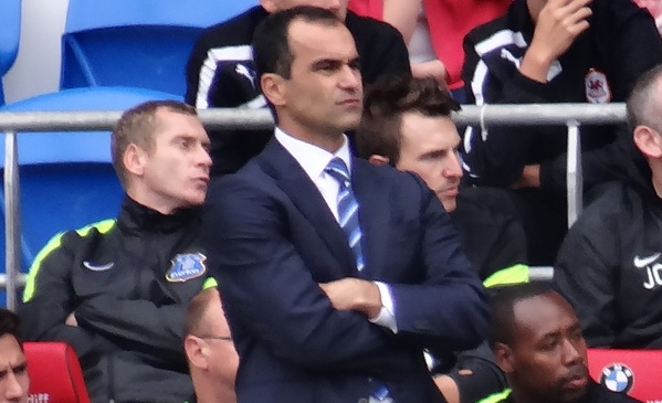Roberto Martinez has stated that he will sign not less than four new players before the start of the season
